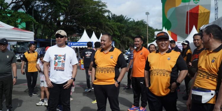 Jelang Hari Bhayangkara Ke – 79, Polresta Samarinda Berikan Pelayanan Kepada Masyarakat di Car Free Day