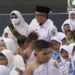 Bupati Kutim Perkenalkan Program Wajib Belajar 13 Tahun saat Manasik Haji Akbar